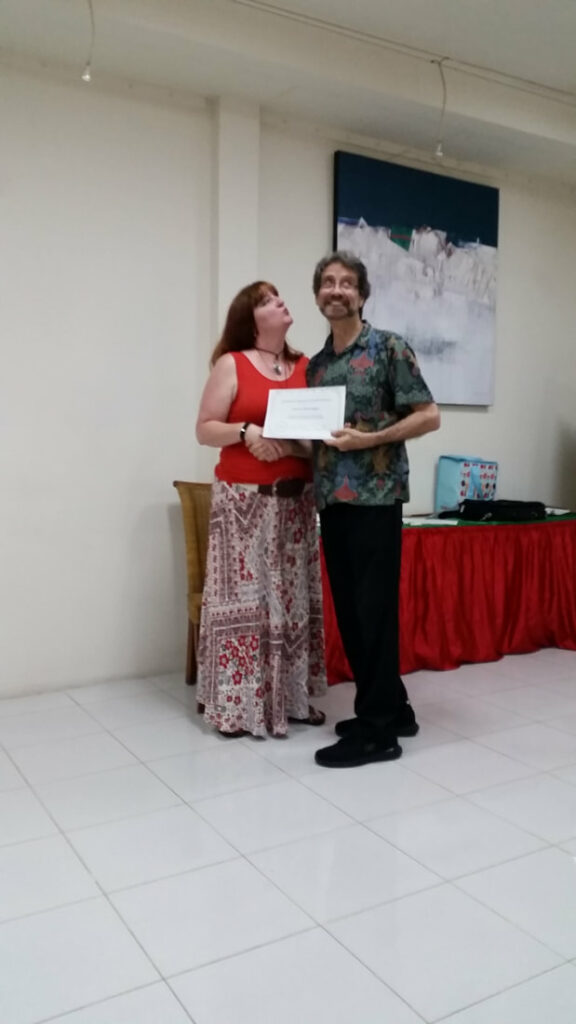 Photo receiving a Certificate with Prof Emmerson in Ubud, Bali